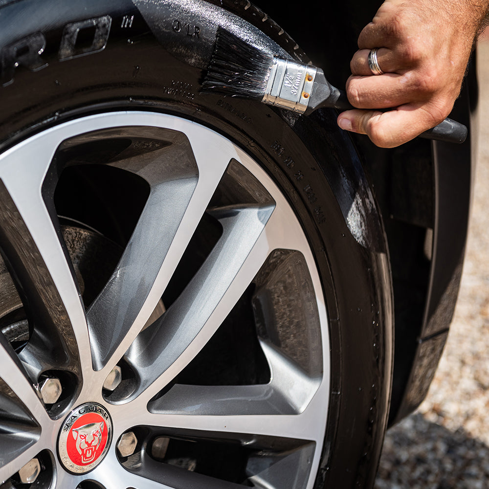 mclaren gloss tyre dressing on car tyre